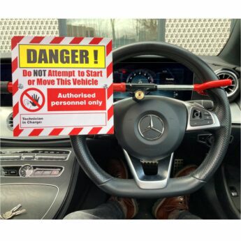 Steering Wheel Lockout with integral Warning Sign
